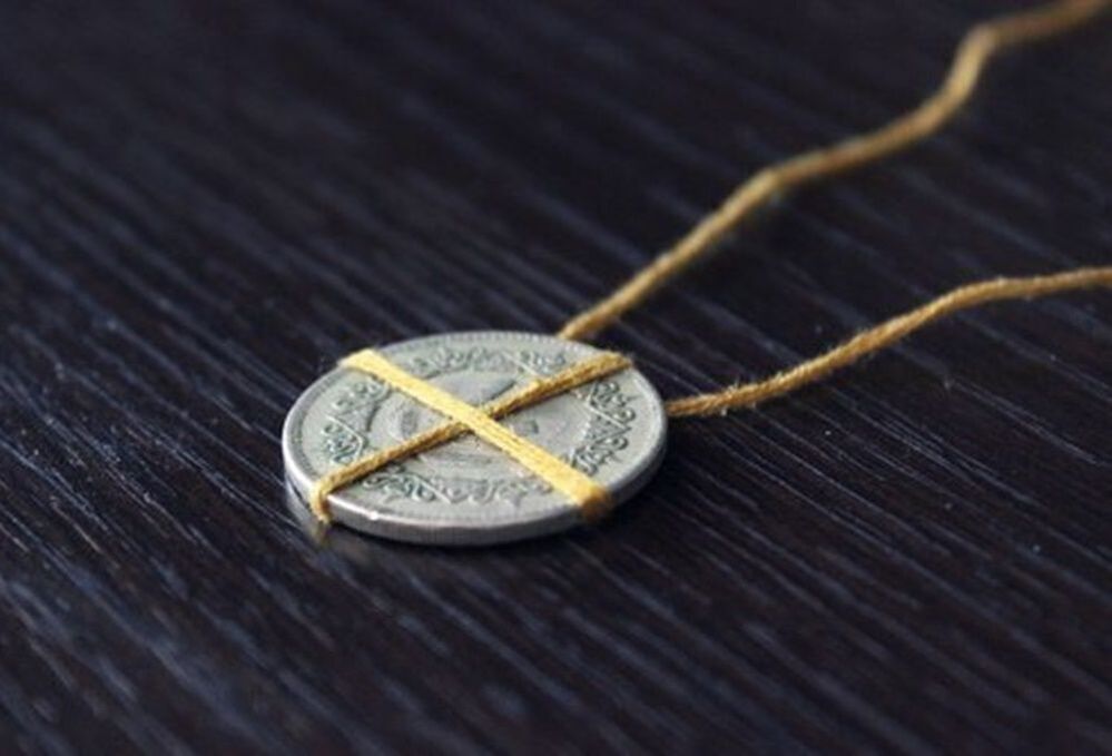 simple amuleto de moeda